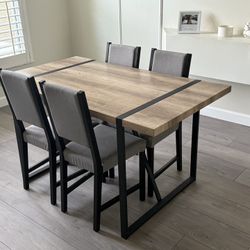 Brown Wood Table With Metal Legs And Chairs