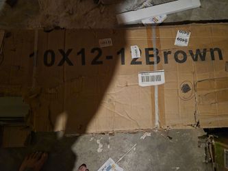 Selling brand new replacement parts, metal panels, and hardware for a 10 ft x 12 ft brown outdoor metal storage shed.