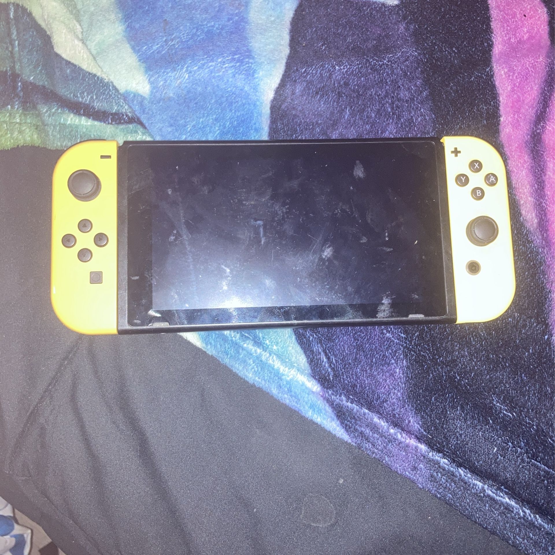 Brown and yellow Nintendo switch