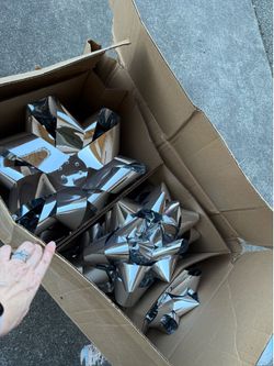 Giant silver Christmas bows