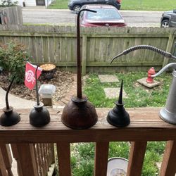Set of 5 Vintage Oil Cans.  They need wiped off.  (Johnstown Ohio)