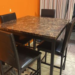 Table And 4 Chairs