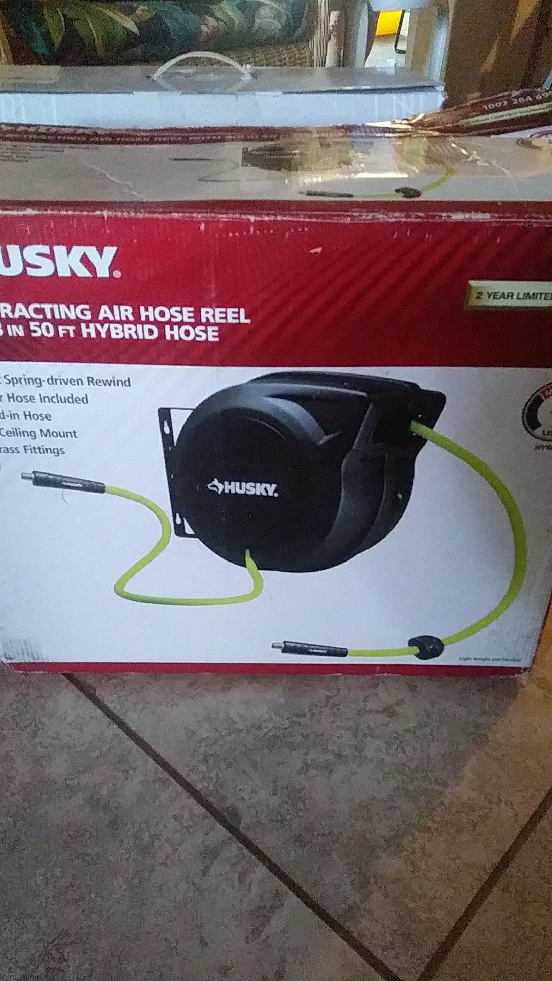 Husky self retracting air.hose reel with 3/8 in 50ft .hybrid hose