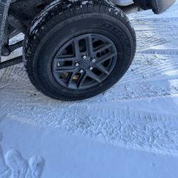 Jeep Gladiator Parts.  Tonneau Cover And Factory Wheels And Tires