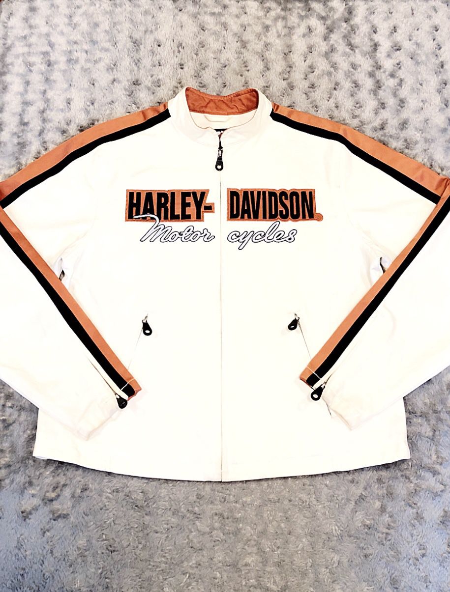 Women's Harley-Davidson paid $205 size Large Excellent condition! Perfect riding jacket. Style #RN 103819. Nylon orange & black stripes, inside pocke