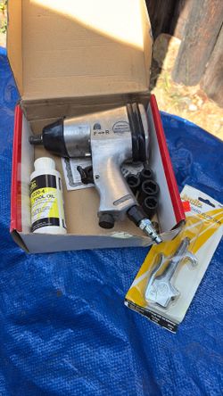 Pneumatic impact with sockets and oil also blow gun