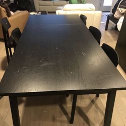 Ikea dining table, extendable. Chairs not included.