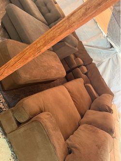 Brown couch with matching loveseat and matching chair and ottoman. Good condition clean we sell for over 14 years.