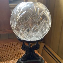Glass cut vase/ bowl on black iron three leg fish stand