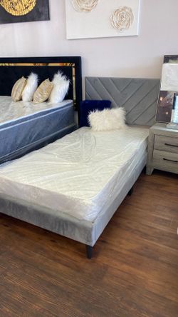 Gray twin size bed frame  with mattress