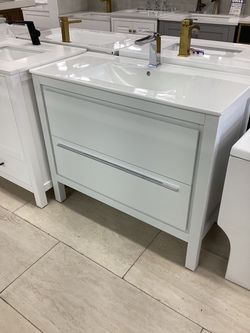 40” bathroom vanity in white color solid wood fully assembled Softclose drawers white ceramic top ready for pick up today