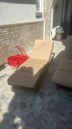 2 Sunbrella fabric cushion lounge chairs