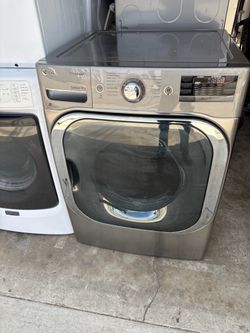 Lg Mega capacity  Steam  Gas dryer Excellent working condition  W29 D33 H40 1/2 9.0 cu ft 3 months warranty parts and labor only
