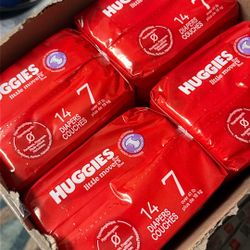 Huggy Diapers, $25 For Four Packs