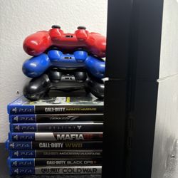 PS4 Slim With 3 Controllers And 8 Games 