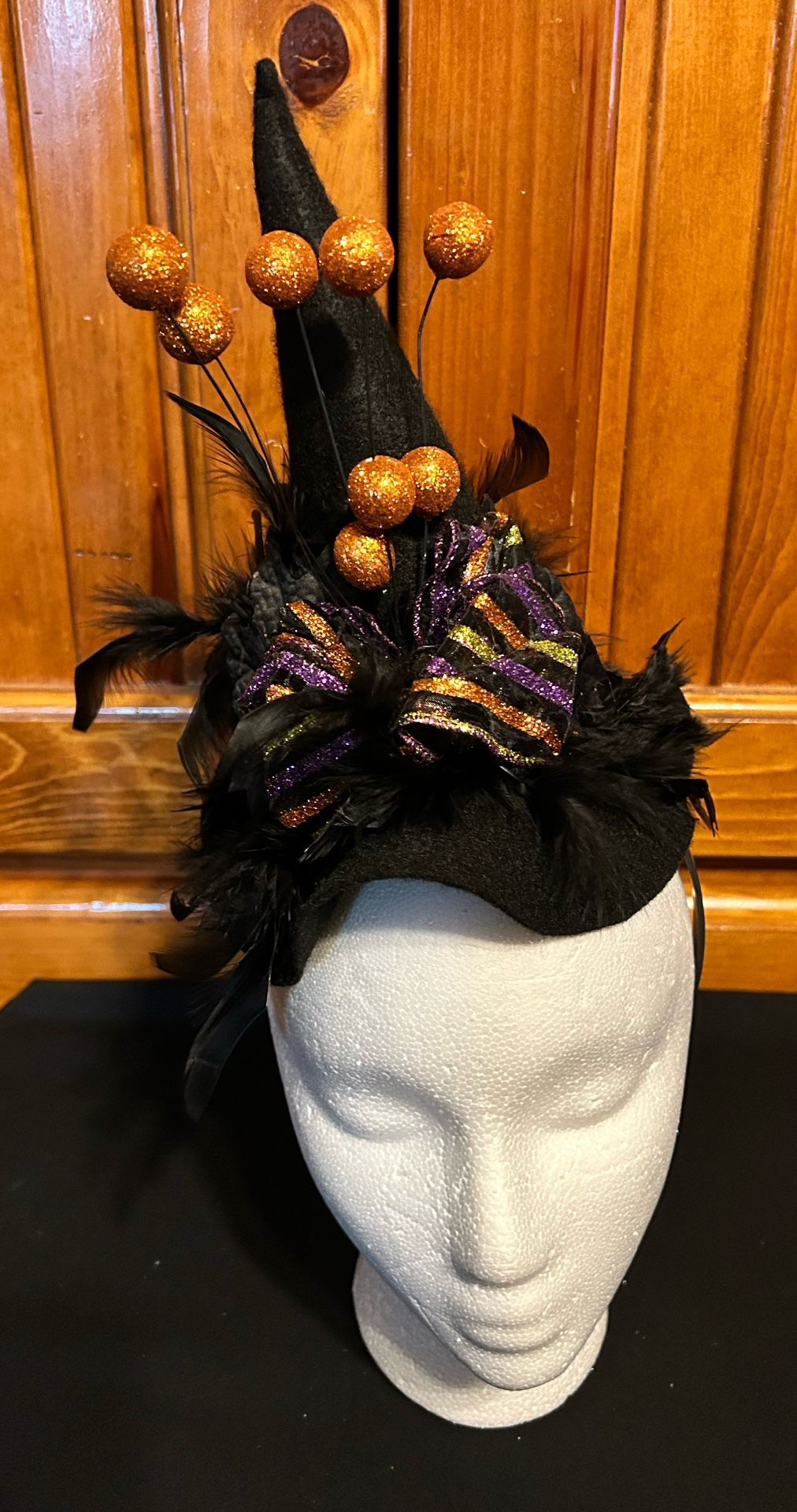 Orange Balls And Feathers, Which Is Hat