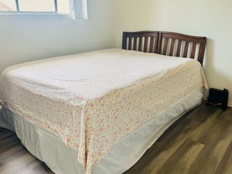 Queen size bed with night stand