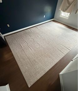 Water resistance, machine washable area rug
