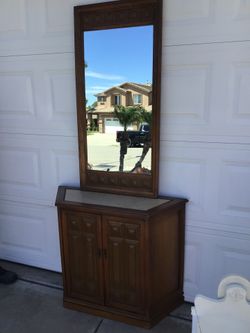 Antique mirror and cabinet