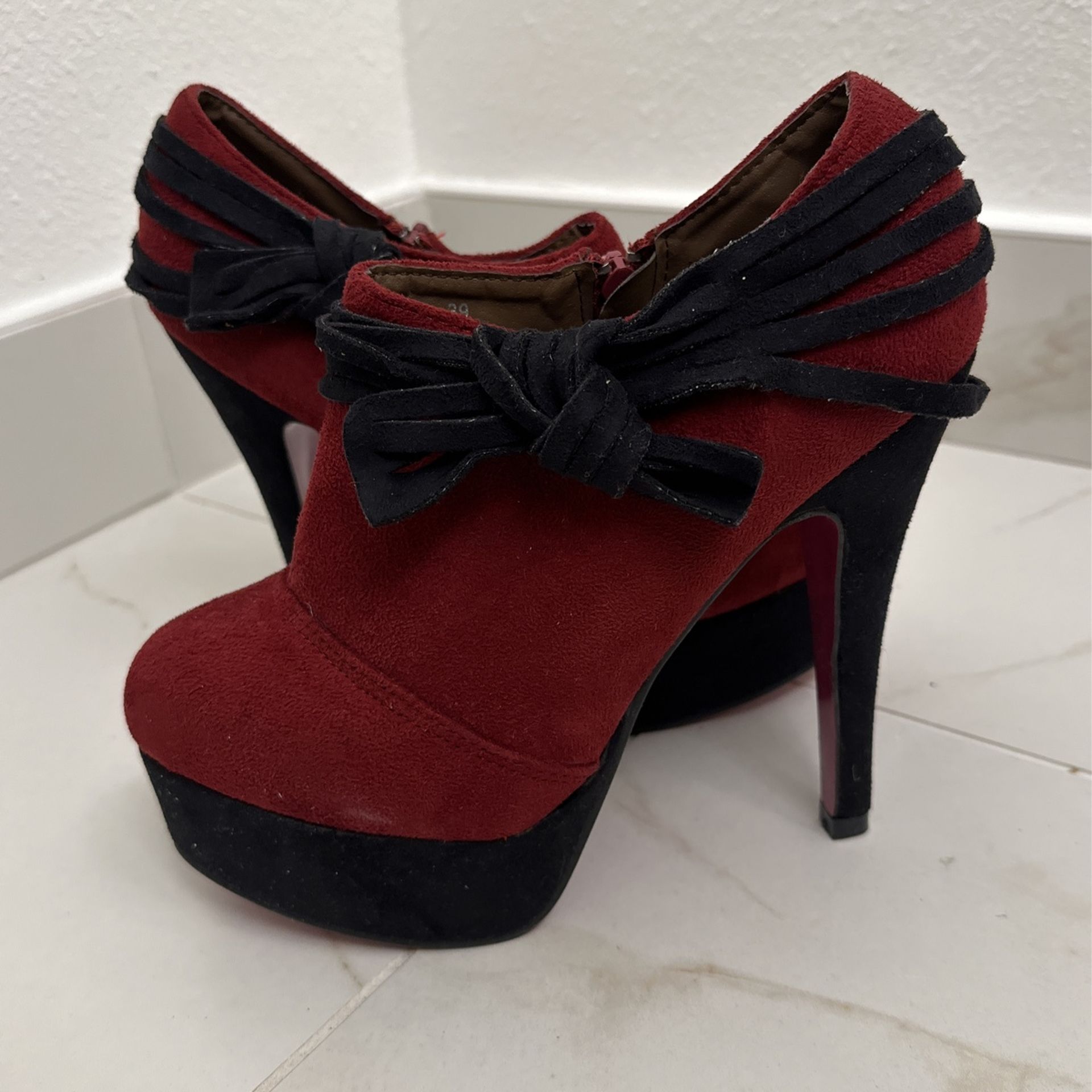 The stiletto platform ankle booties