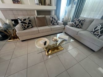 Sofa and loveseat with tables