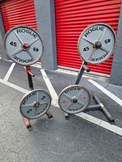 4 Rogue 45LB Machined Olympic Weight Plates. Homestead 33033. Delivery fee.

Heavy-duty cast-iron Rogue 45lb machined Olympic weight plates come in a 