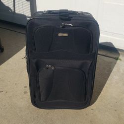 Suitcase On Wheels And With Duffle Bag 
