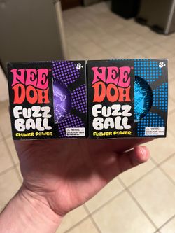 Purple and blue fuzz Needoh balls