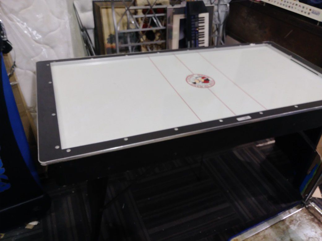 Can deliver air hockey table