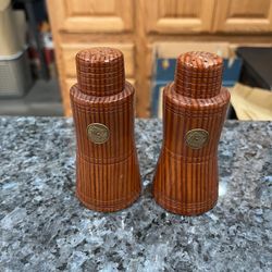 Vintage Hand carved Wood Pair of Salt and Pepper Shakers.   Souvenir from The Franklin Roosevelt Memorial Commission.  Size approximately 4 inches tal