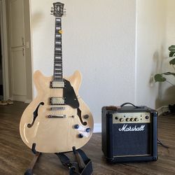 Hollow Body Guitar And Marshall Amp 