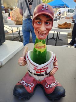 Baseball player wine bottle holder