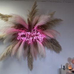 Pink Neon Sign Wall Decor with Pampas Grass Backdrop