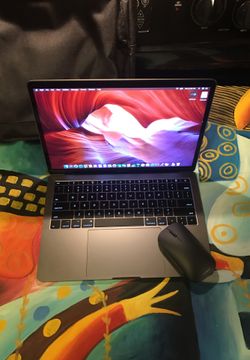 2018 MacBook Pro With Bag and Mouse