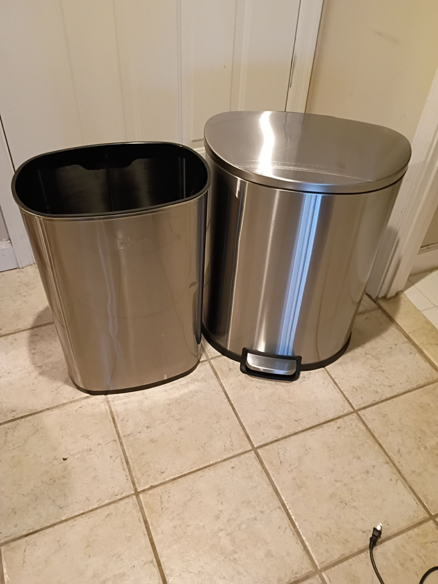 2 stainless steel trash cans very good condition