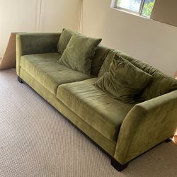 Nice comfy green couch. Only $70. Why pay $800? Has to be hoisted out two story window.