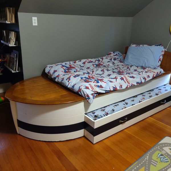 Twin size boat bed with pull out trundle bed for Sale in Snohomish, WA