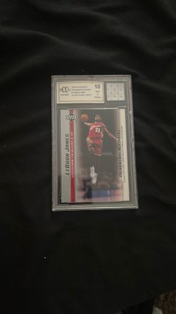 2003-04 Upper Deck Phenomenal Beginnings #5 LeBron James With High School Jersey