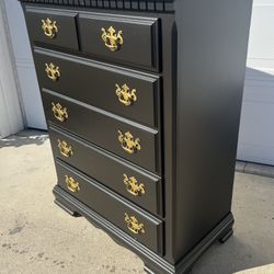 Tall refinished dresser