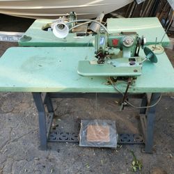 Sewing machine with tables 