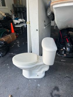 White Briggs Toilet w/ Seat