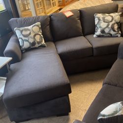 Three-Piece Brand New Living Room Suit $1500 Includes sectional with Chase chair and loveseat. All three pieces brand new hurry, limited quantitntitie