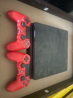 PS4 and two controllers