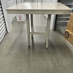 Dinner table with chairs