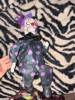 sitting creepy moving glowing doll