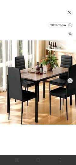 Dinning table and 4 chairs (in the box)