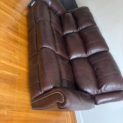 (Free Delivery) Brown leather dual reclining sofa