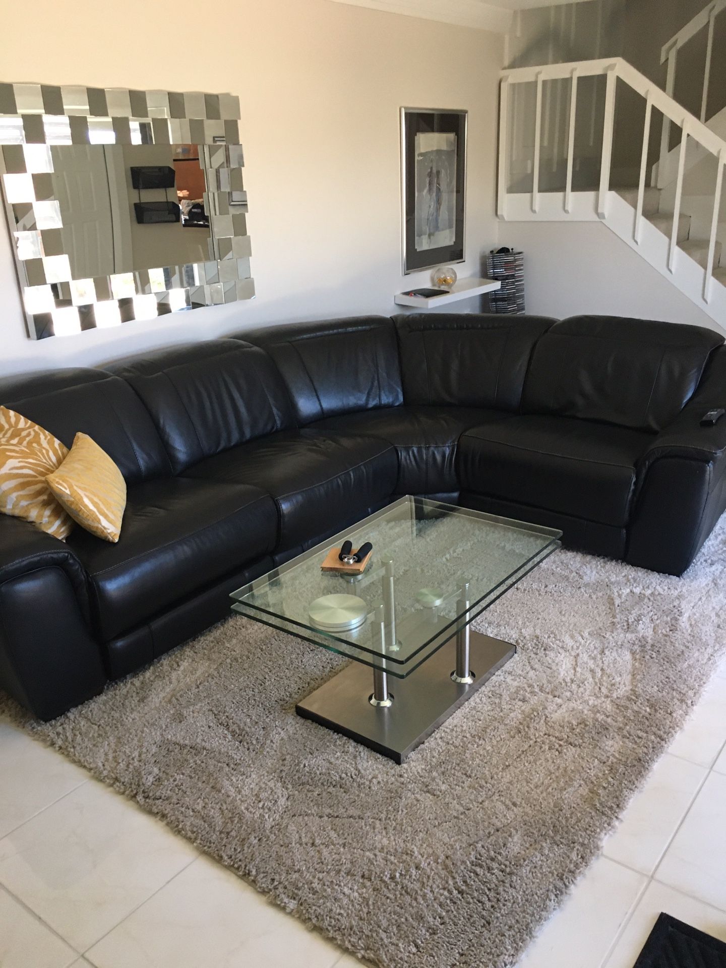 Modern living room set beautiful leather sectional with two recliners and console Plus modern glass and Chrome motion table $1700