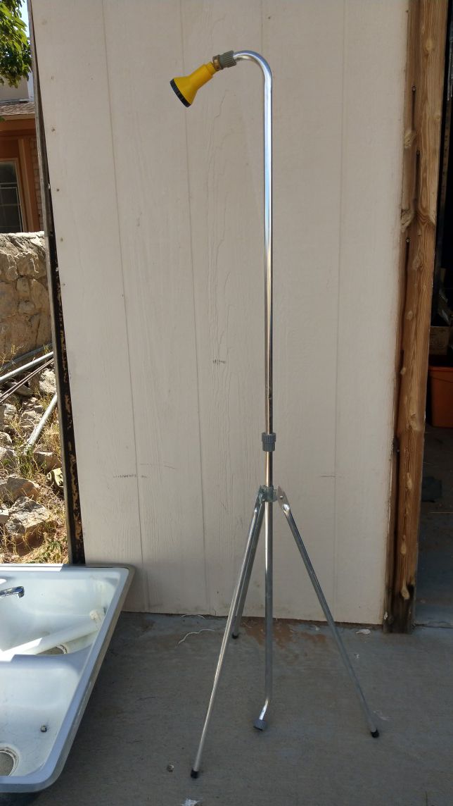 NE portable outdoor shower with tripod $20