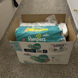 Newborn Pampers Pure & Pampers Swaddlers Diapers 